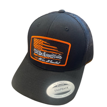 Load image into Gallery viewer, NEW &quot;We The Essentials&quot; Black on Black Trucker Hat with Orange Patch
